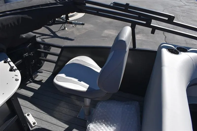 Slide: The Image of 2026 Lowe SF 232 WT Sport Fish boat interior with seating and cup holders. - 23