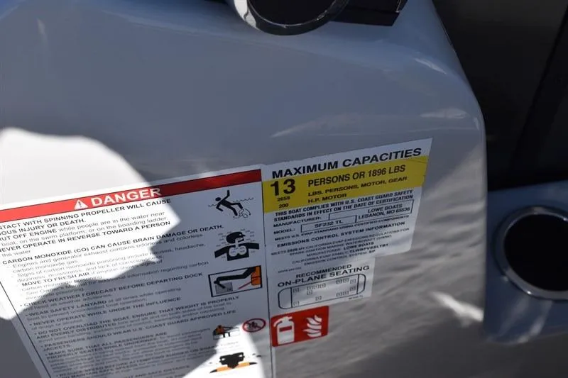 Slide: The Image of Safety label on 2026 Lowe SF 232 WT Sport Fish boat, indicating maximum capacity of 13 persons. - 34