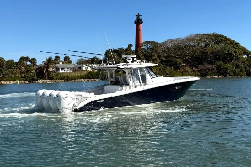 The Image of 2023 Pursuit S 428 Sport boat near lighthouse. - 0