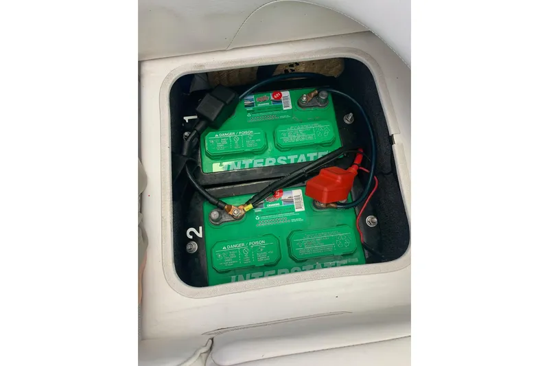 Slide: The Image of Battery compartment of a 2006 Conquest 28 Top Cat II boat. - 17