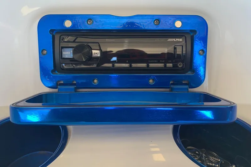 Slide: The Image of 2006 Conquest 28 Top Cat II with Alpine stereo system in blue casing. - 9