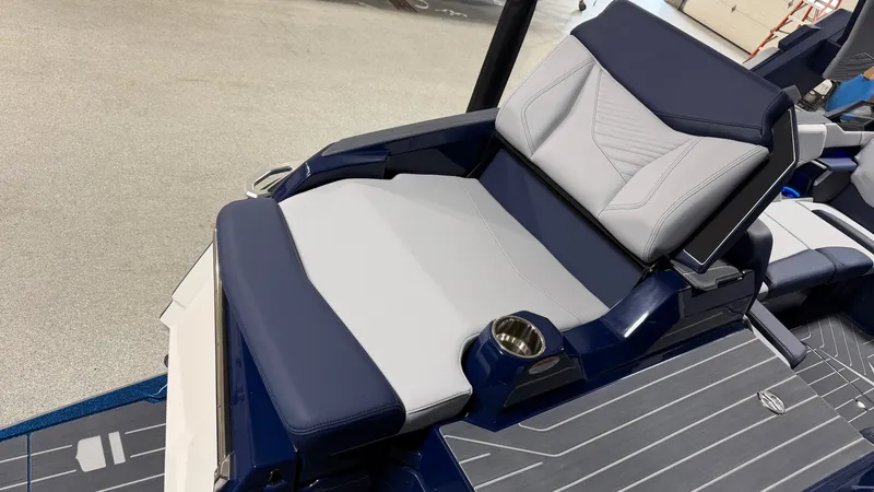 Slide: The Image of The image shows a luxurious seating area on a 2027 MasterCraft XT23 boat. - 11