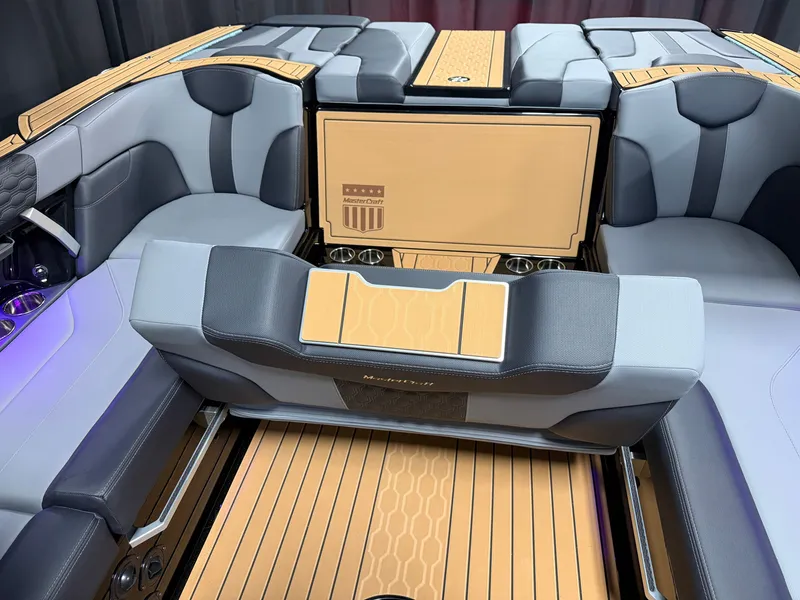 Slide: The Image of The image shows the luxurious interior of a 2027 MasterCraft XT23 boat with sleek seating. - 37