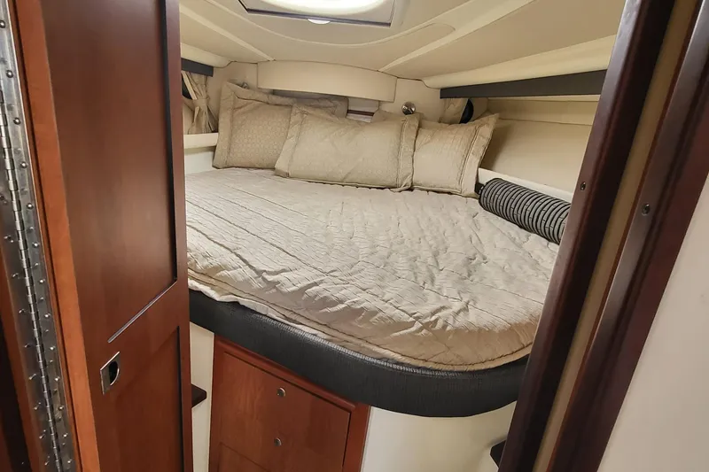 Slide: The Image of Cozy cabin interior of 2008 Monterey 350 Sport Yacht with comfortable bedding. - 16