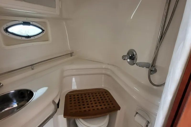 Slide: The Image of Bathroom interior of 2008 Monterey 350 Sport Yacht with shower and porthole window. - 20