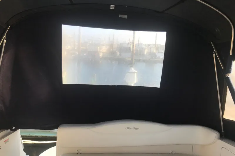 Slide: The Image of 2004 Sea Ray Sundancer 280 interior with window view of marina. - 15
