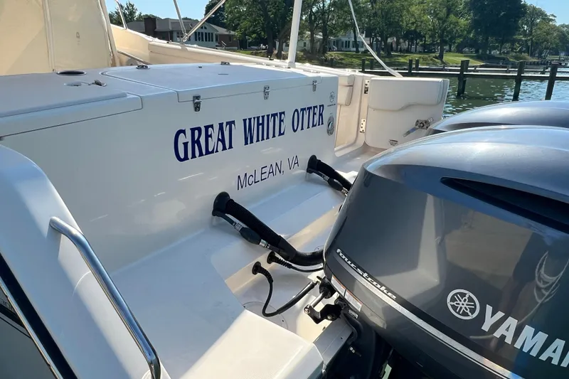Slide: The Image of 2017 Grady-White Marlin 300 boat with Yamaha engines, named "Great White Otter," docked in McLean, VA. - 28