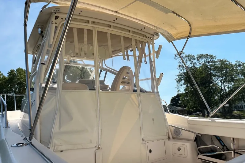 Slide: The Image of 2017 Grady-White Marlin 300 boat with enclosed cockpit and canopy. - 29