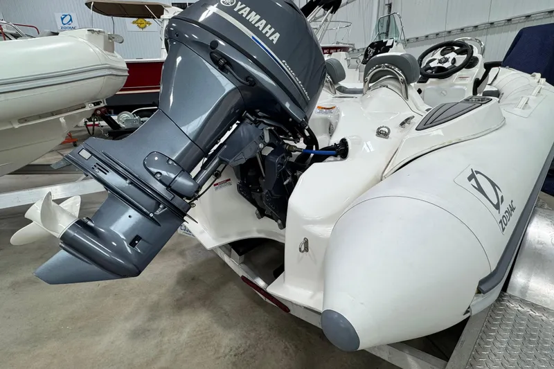 Slide: The Image of Zodiac Yachtline 440 (2021) with Yamaha outboard motor in a showroom. - 14