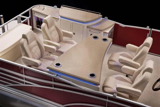 Slide: The Image of Manufacturer Provided Image: 2015 Bennington 2575 QSD boat interior with luxurious seating and table. - 4