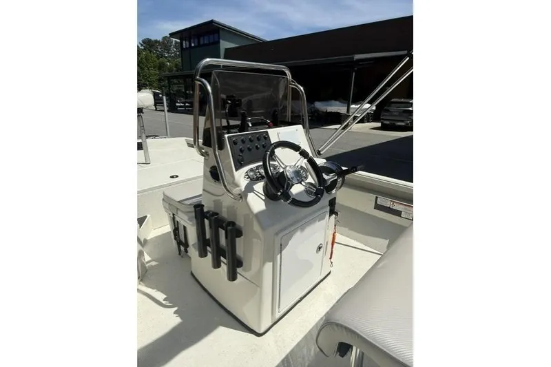 Slide: The Image of 2020 RAB RB190 boat console with steering wheel and control panel in sunlight. - 7