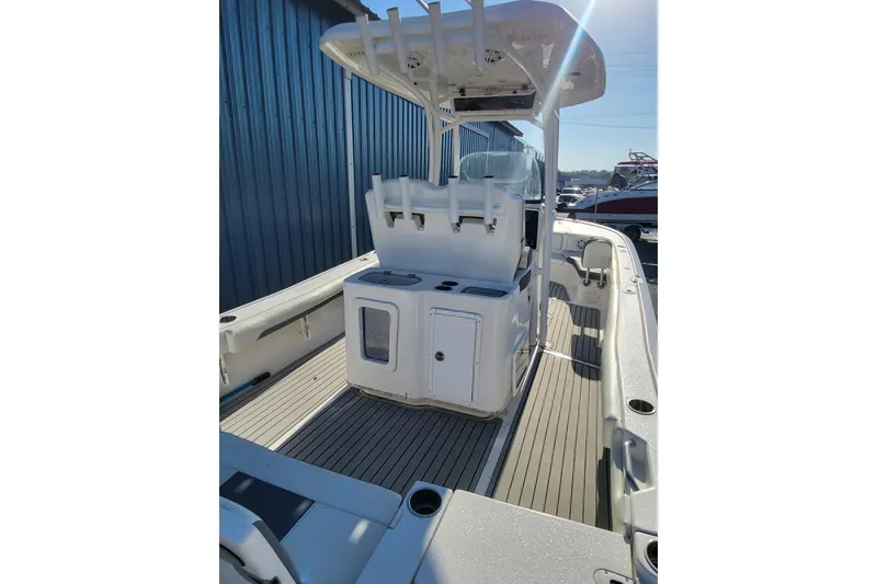 Slide: The Image of 2020 Tidewater 2700 Carolina Bay boat interior with center console and seating. - 4