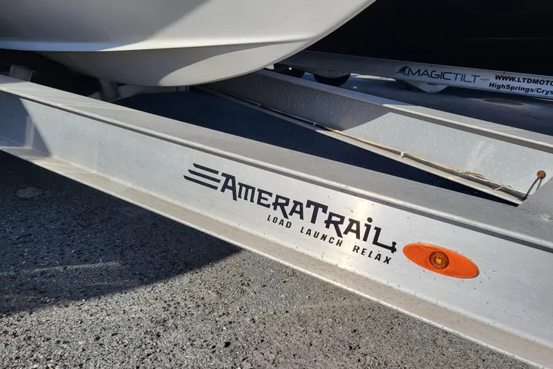 Slide: The Image of Trailer for 2020 Tidewater 2700 Carolina Bay boat, featuring AmeraTrail branding. - 7