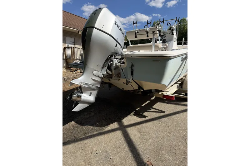 Slide: The Image of 2018 Tidewater 1910 Bay Max boat with Honda outboard motor on trailer. - 3