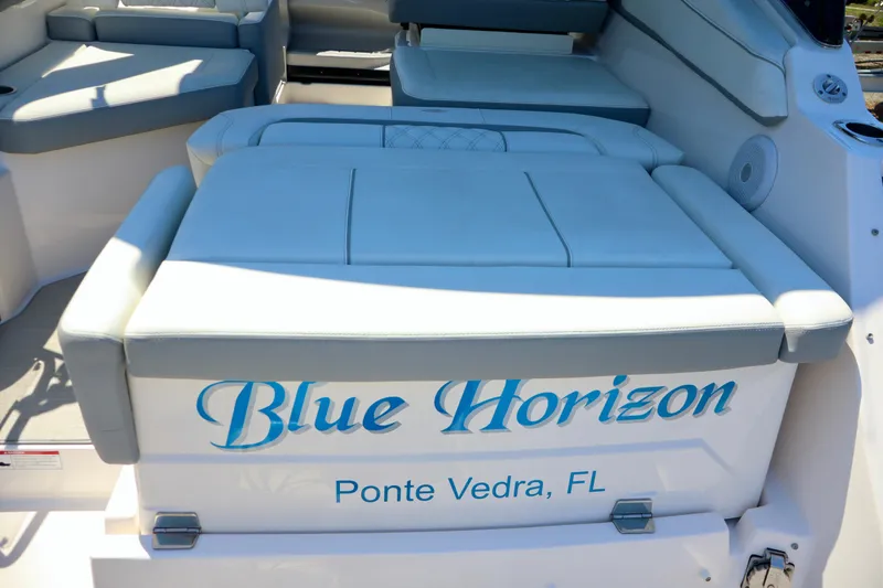Slide: The Image of 2023 Regal 26 XO boat interior with "Blue Horizon" text, Ponte Vedra, FL. - 11
