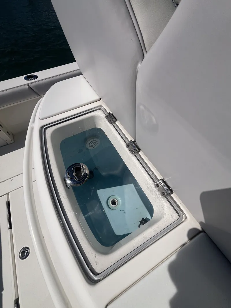 Slide: The Image of ShearWater Carolina 2020 boat with open storage compartment. - 29