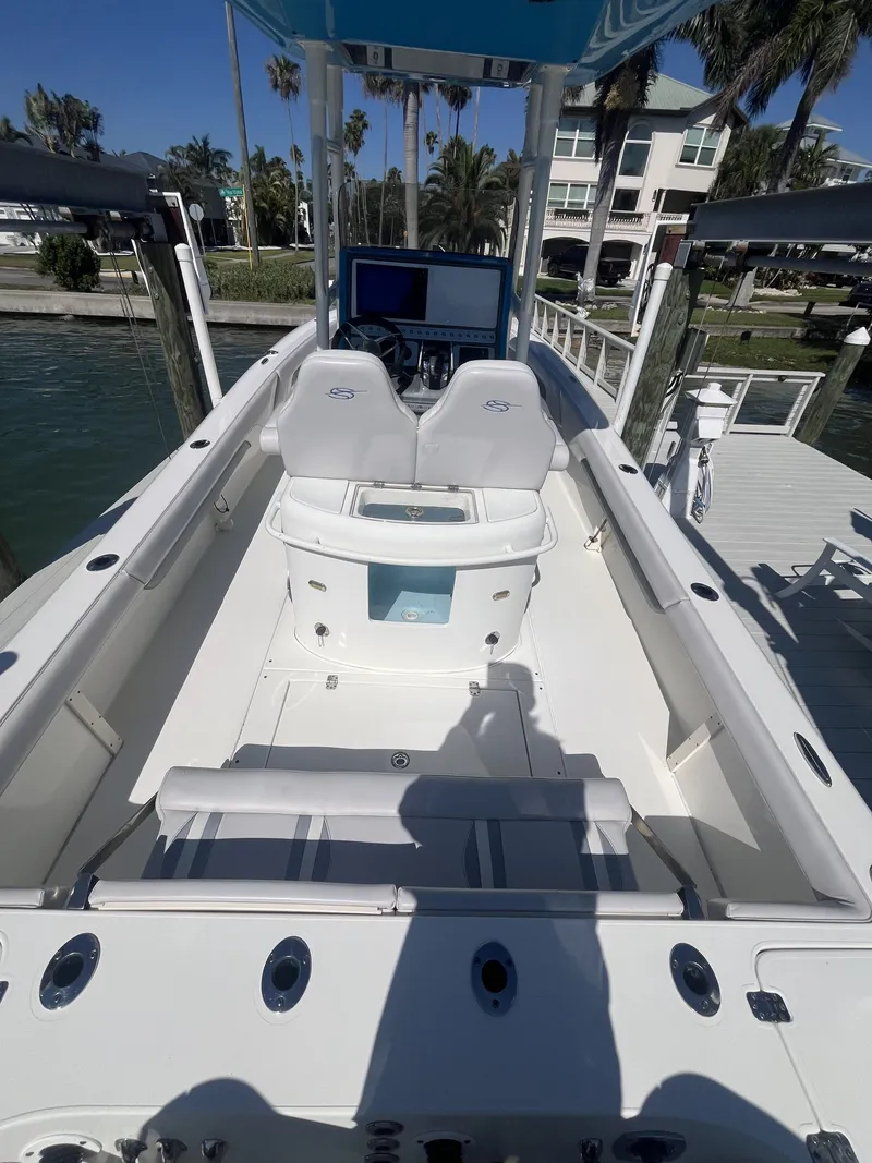 Slide: The Image of Interior view of a 2020 ShearWater Carolina boat at the dock. - 7