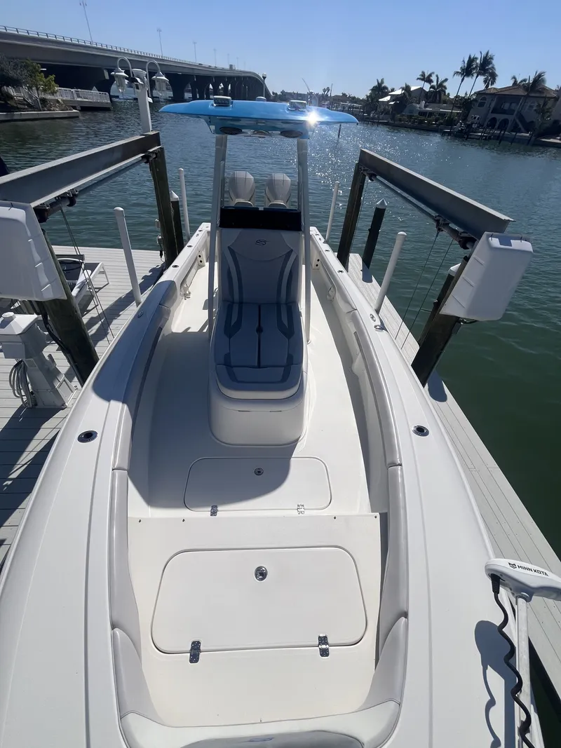 Slide: The Image of 2020 ShearWater Carolina boat docked in sunny weather. - 9