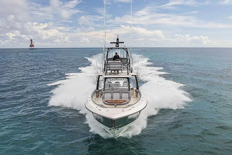 Slide: The Image of Manufacturer Provided Image: 2025 Boston Whaler 420 Outrage cruising on open ocean waters. - 1