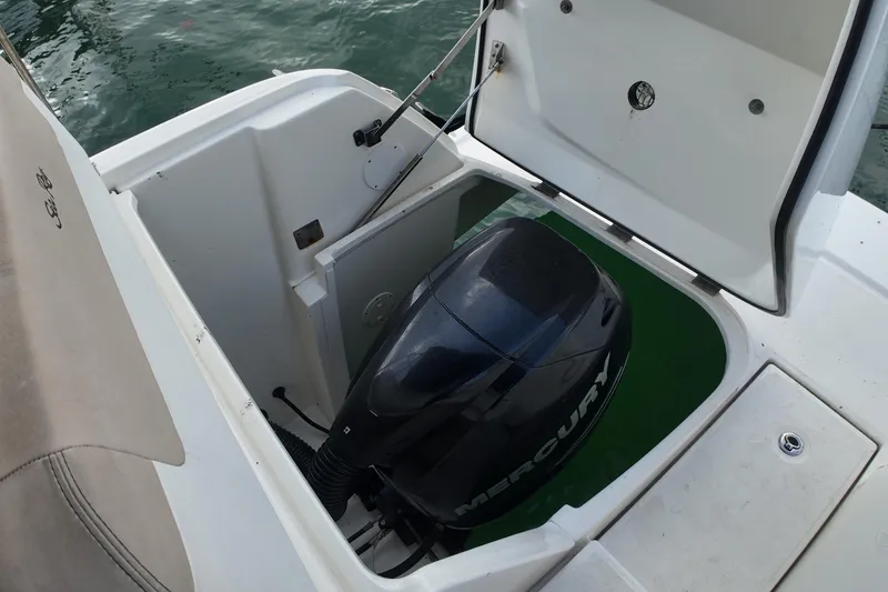 Slide: The Image of 2015 Sea Ray 370 Venture boat with Mercury engine compartment open. - 3