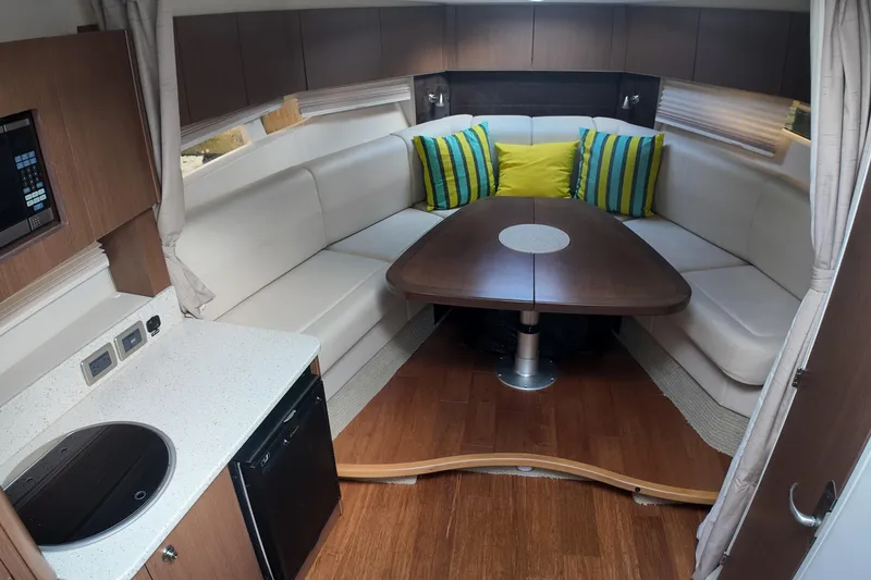 Slide: The Image of Luxurious interior of 2015 Sea Ray 370 Venture yacht with cozy seating and modern amenities. - 5