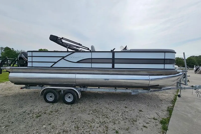The Image of 2026 Bentley Pontoons 243 FNC Fish N Cruise on trailer, side view. - 1