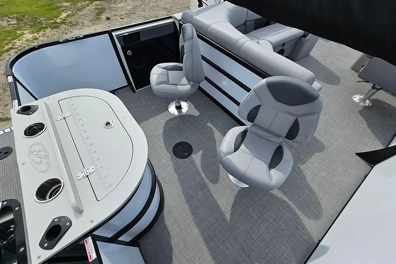 Slide: The Image of 2026 Bentley Pontoons 243 FNC interior with seating and fishing station. - 12