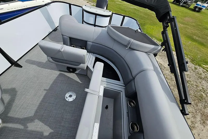 Slide: The Image of 2026 Bentley Pontoons 243 FNC interior with gray seating and modern design. - 17