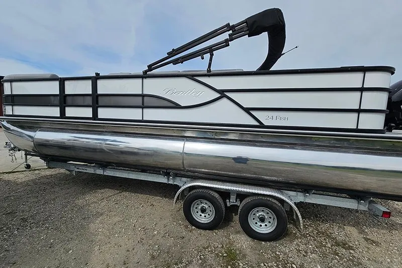 Slide: The Image of 2026 Bentley Pontoons 243 FNC Fish N Cruise on trailer, side view. - 7