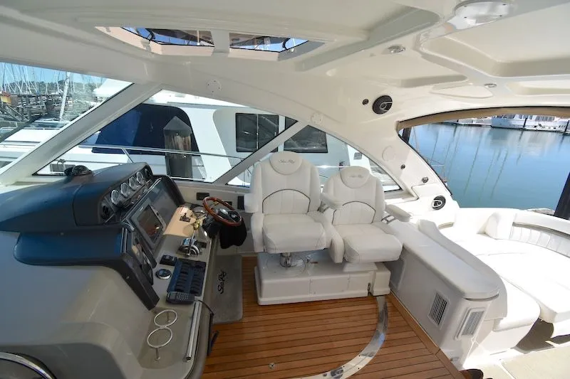 Slide: The Image of Interior of 2007 Sea Ray 48 Sundancer with luxurious seating. - 14