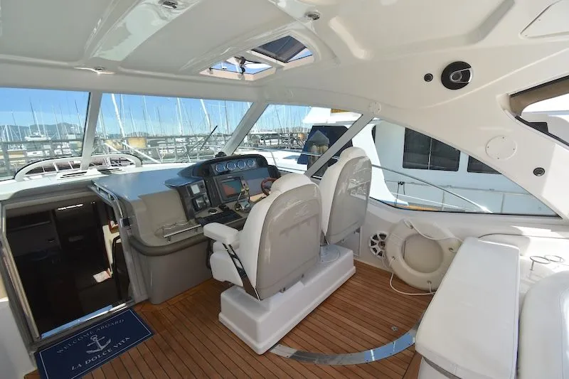 Slide: The Image of Interior of a 2007 Sea Ray 48 Sundancer yacht with helm station. - 16