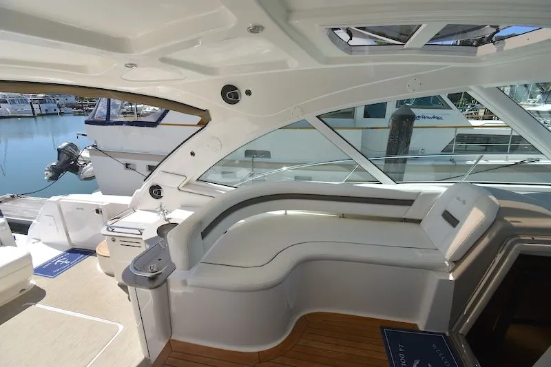 Slide: The Image of Interior of a 2007 Sea Ray 48 Sundancer yacht at the marina. - 19
