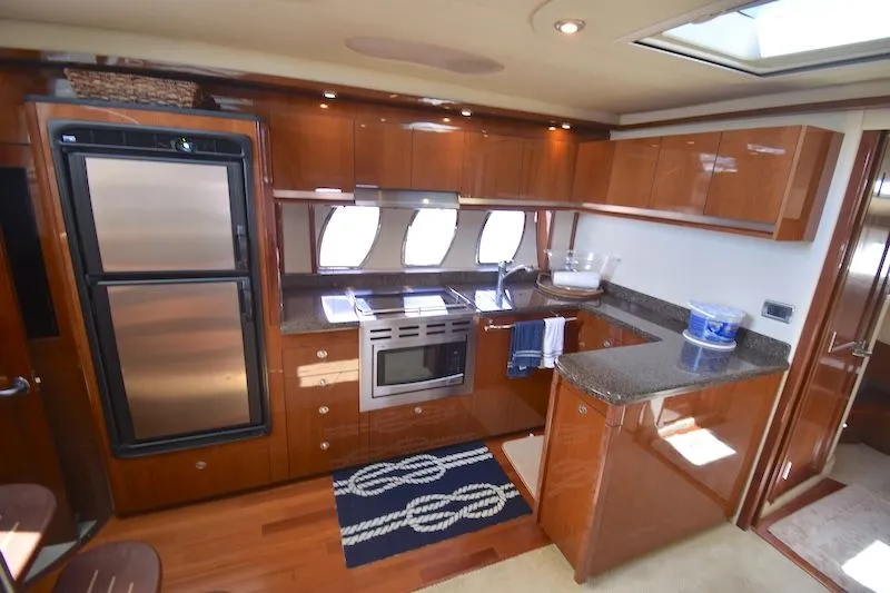 Slide: The Image of Luxurious kitchen in a 2007 Sea Ray 48 Sundancer yacht. - 22
