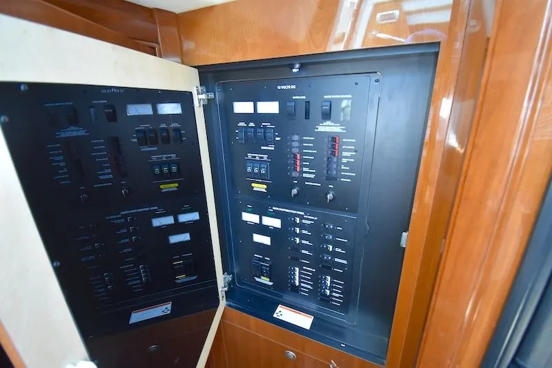 Slide: The Image of Electrical control panel of 2007 Sea Ray 48 Sundancer. - 25
