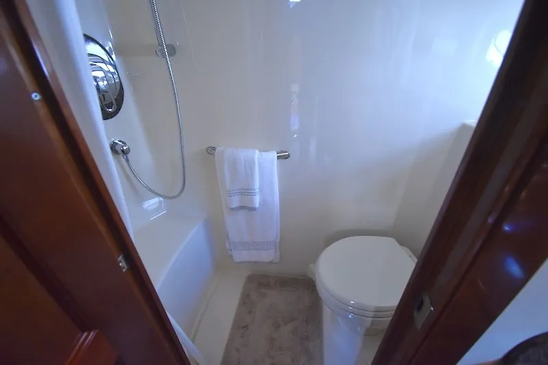 Slide: The Image of Sea Ray 48 Sundancer 2007 bathroom with shower and toilet. - 29