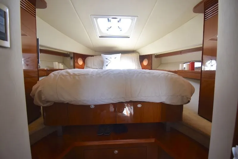 Slide: The Image of Luxurious cabin of 2007 Sea Ray 48 Sundancer with comfortable bed. - 33