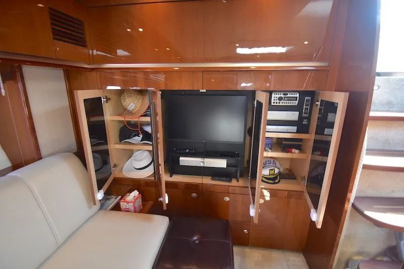 Slide: The Image of Interior of 2007 Sea Ray 48 Sundancer with entertainment system. - 34