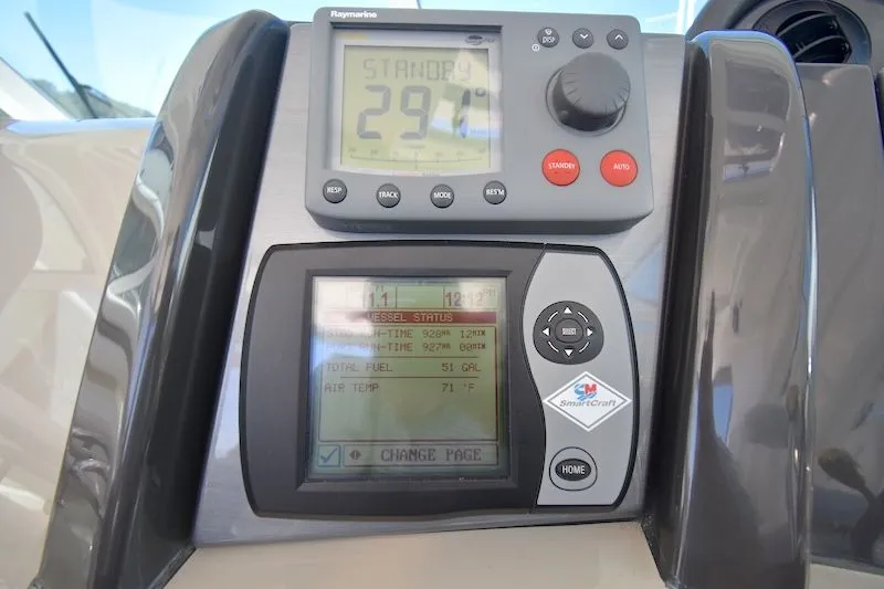Slide: The Image of 2007 Sea Ray 48 Sundancer dashboard with SmartCraft display. - 39