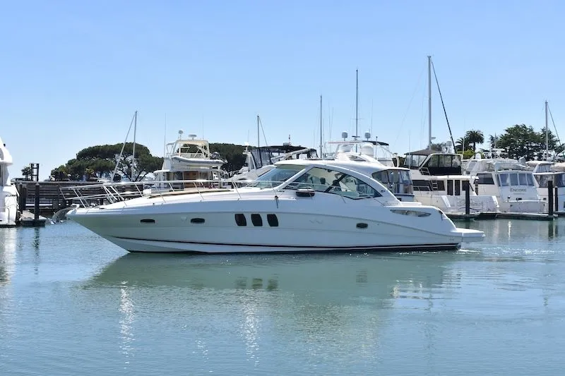 Slide: The Image of 2007 Sea Ray 48 Sundancer yacht in harbor. - 4
