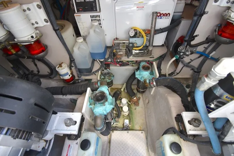 Slide: The Image of Engine room of 2007 Sea Ray 48 Sundancer with technical components. - 42