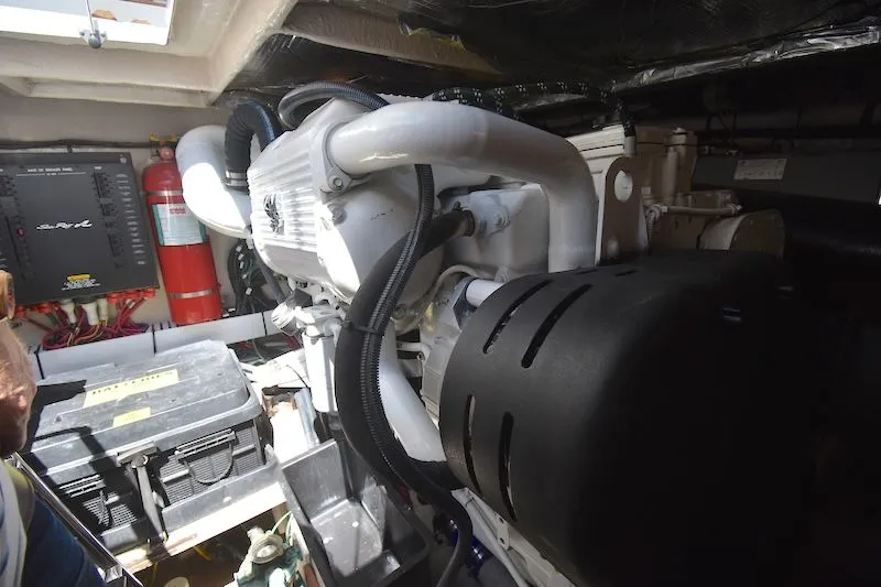 Slide: The Image of Engine room of 2007 Sea Ray 48 Sundancer with engine and equipment. - 43