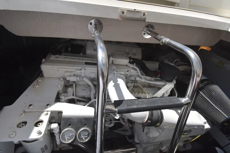 Slide: The Image of Engine compartment of 2007 Sea Ray 48 Sundancer with ladders. - 48