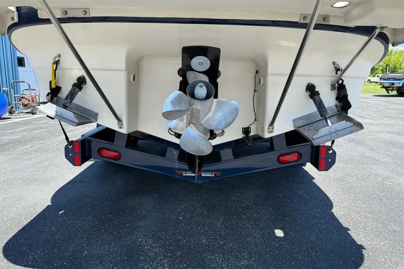 Slide: The Image of Rear view of a 2005 Regal Commodore 2665 boat on a trailer. - 7
