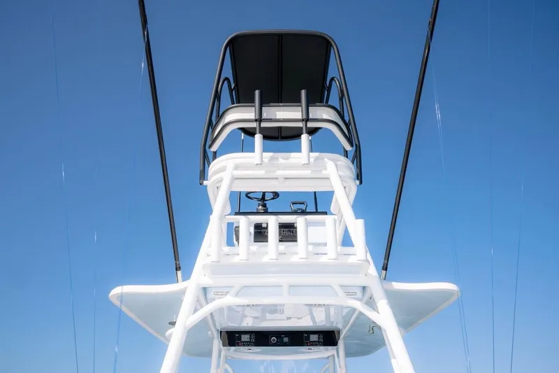 Slide: The Image of Contender 39 ST 2026 boat tower against clear blue sky. - 17