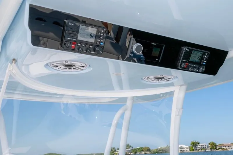 Slide: The Image of 2026 Contender 39 ST boat dashboard with modern navigation and communication equipment. - 21