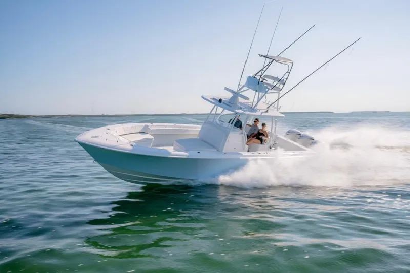Slide: The Image of 2026 Contender 39 ST boat cruising swiftly on open water. - 23