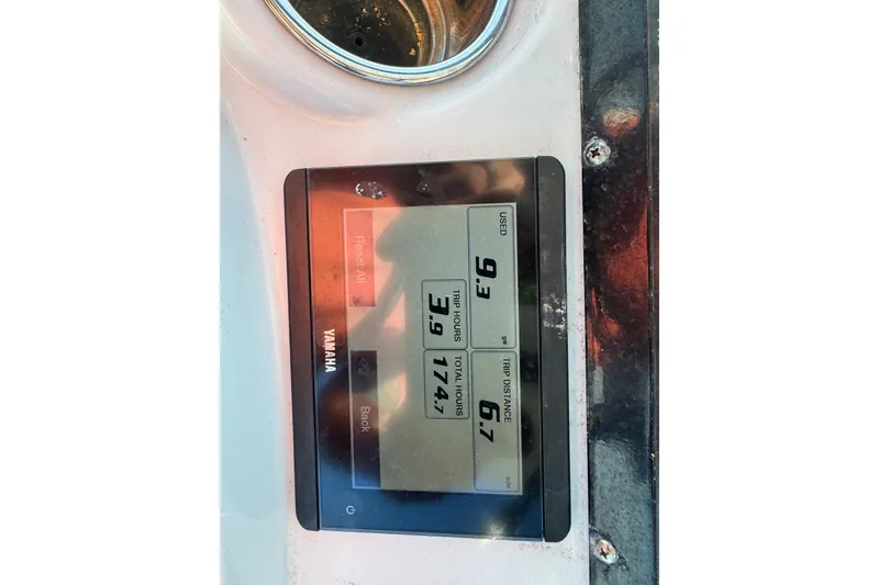 Slide: The Image of Yamaha display on 2022 Pathfinder 2400 TRS showing trip data and fuel usage. - 12