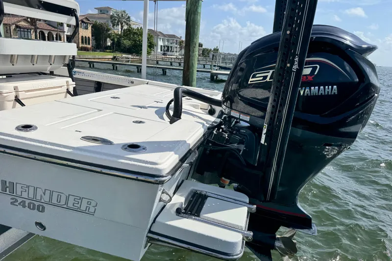 Slide: The Image of Pathfinder 2400 TRS 2022 with Yamaha engine by the water. - 19