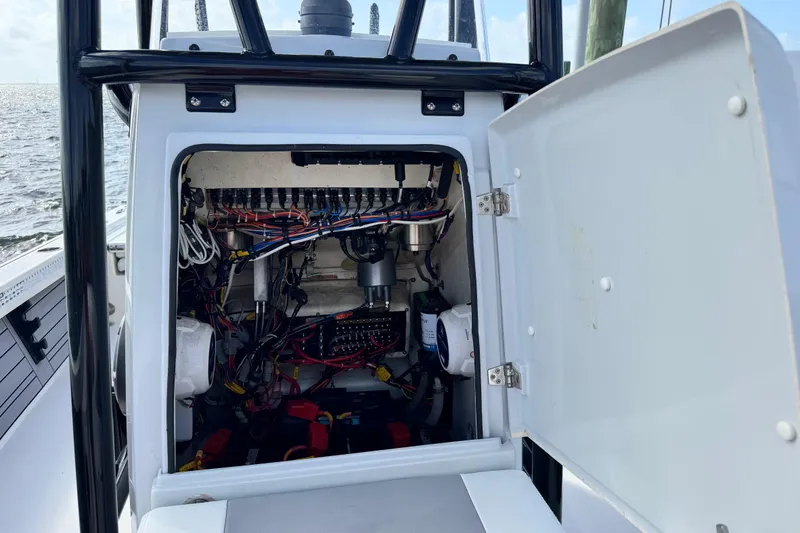 Slide: The Image of Electronics compartment of a 2022 Pathfinder 2400 TRS boat. - 36