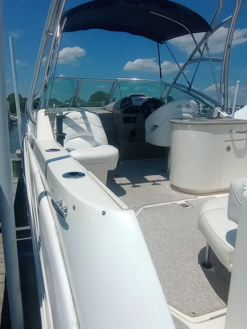 Slide: The Image of 2005 Sea Ray 270 Amberjack boat with canopy and helm station. - 10